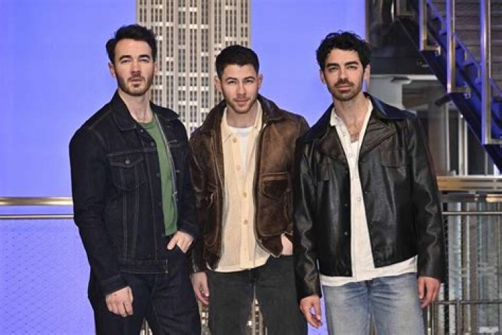 Nick Jonas with his siblings, Jonas Brothers Band Nick Jonas with his siblings, Jonas Brothers Band