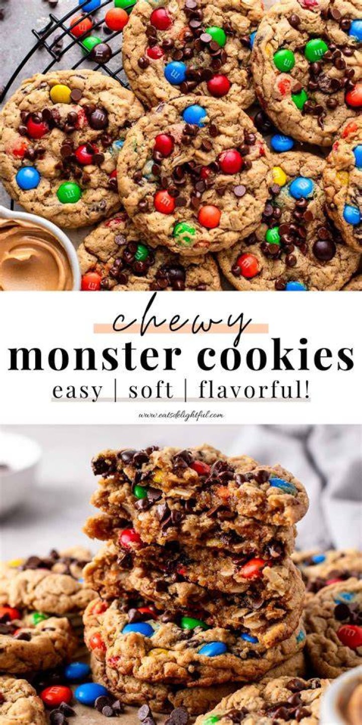 Two Monster Cookies stacked on top of each other with a bite taken out of the top cookie.